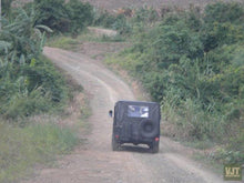 Load image into Gallery viewer, Mythical Kulen Mountain Jeep Tours Cambodia Jeep 
